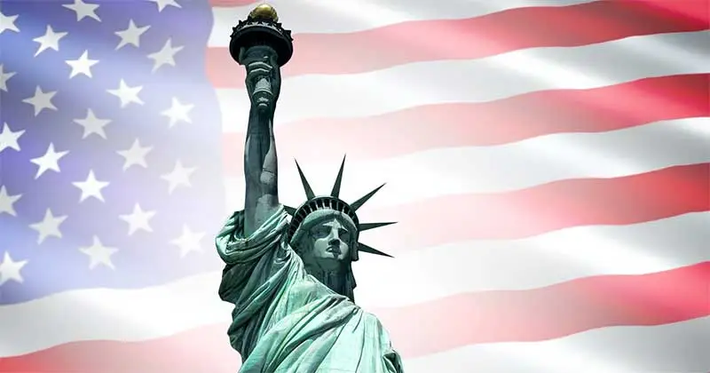 Statue of liberty and flag